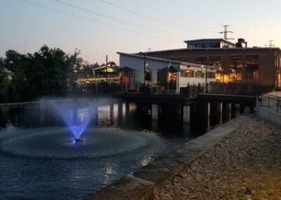 Revolution Mill at dusk with Fountains