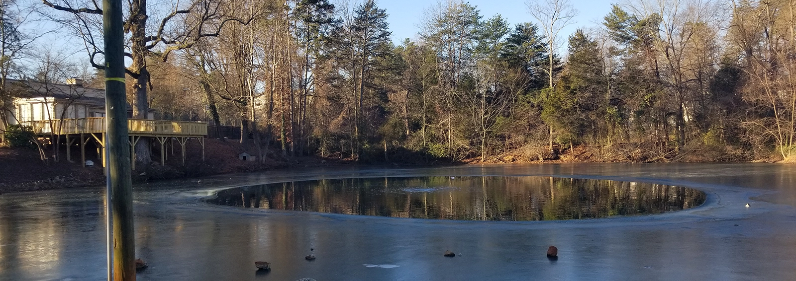 Iced over pond, can lead to winter fish kill