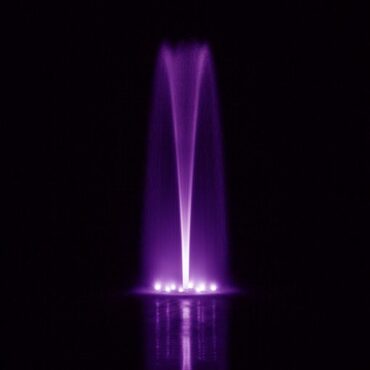 Purple Lights on Gusher Spray onPond Fountain